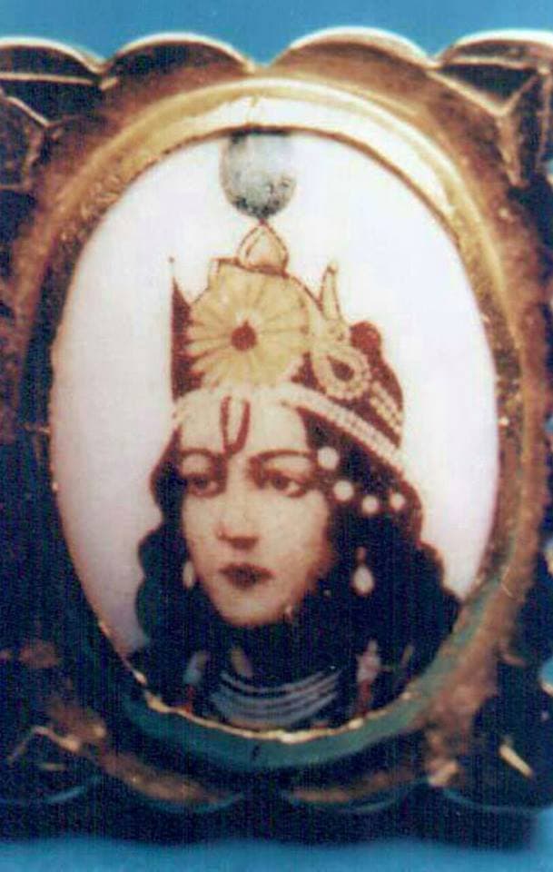 Sri Krishna in His late teens — the picture materialised by Swami inside a gold ring